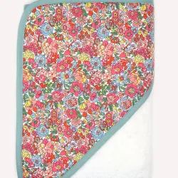 Cape de bain Augustine avec motif floral coloré, bordure verte