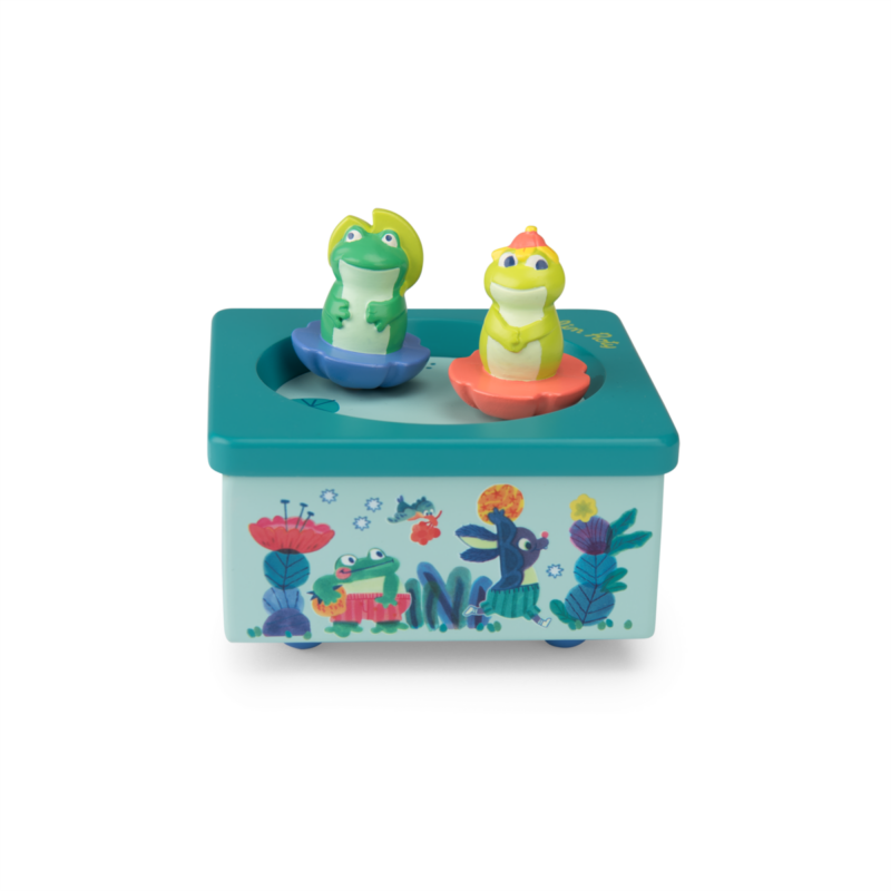 Boîte à musique La mare aux grenouilles avec figurines de grenouilles colorées sur le dessus